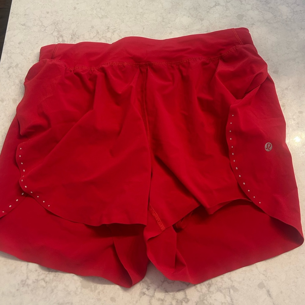 Dark red Luluemon fast and free reflective high rise shorts size 8. 3 inch.